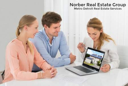 real estate agent with couple